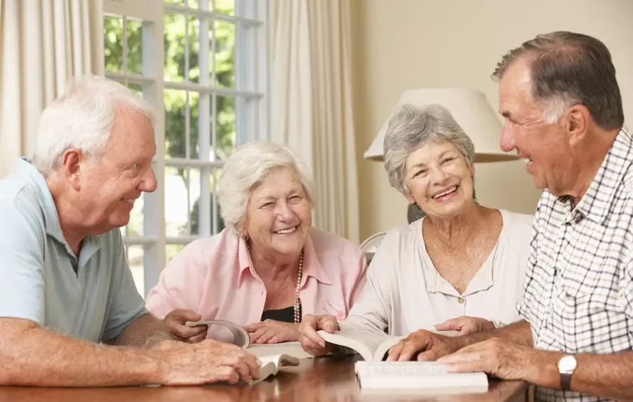 bigstock-Group-Of-Senior-Couples-Attend-92381933-890x565.webp